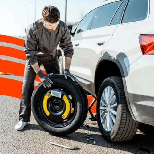 roadside tire change near me call urgent help